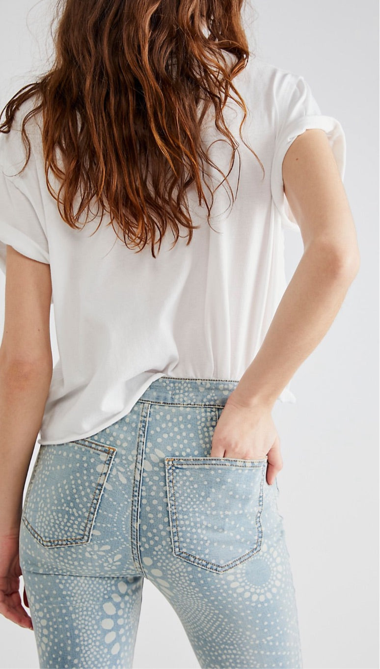 Free People - Make a statement in the Just Float On Printed Flare Jeans for  under $100. Shop now.